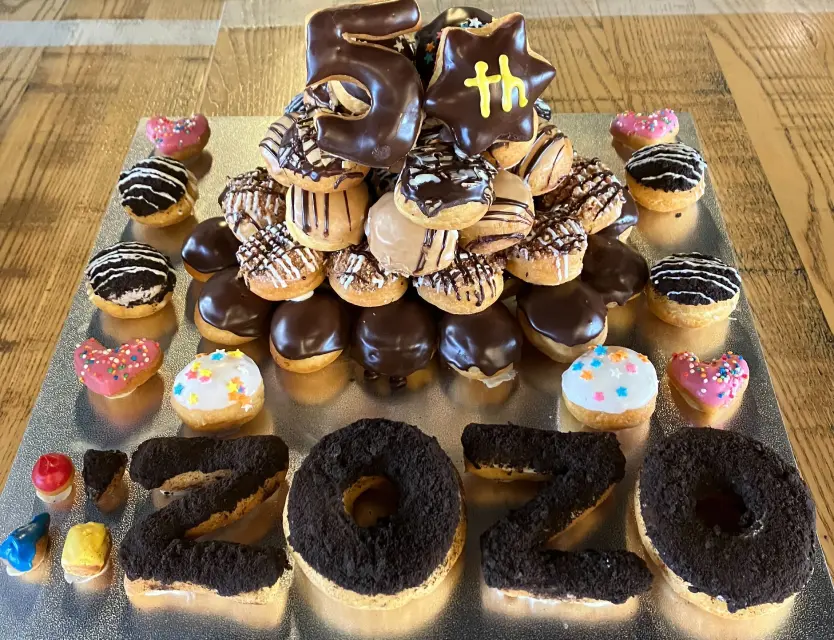 Team celebration with donuts